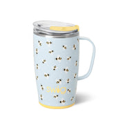 Swig Life 18oz travel mug with handle and lid, ideal for on-the-go use.