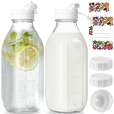 Syntic 2-pack glass milk bottles with dispenser caps for airtight storage.