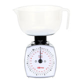 TADA 11lb analog scale front view showing precise measurements for ingredients.