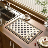 Tatibana dish drying mat shows absorbent surface soaking up water quickly.