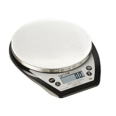 Taylor 1020NFS compact scale on a kitchen counter for precise portion control.
