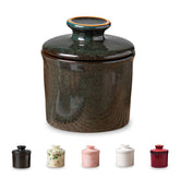 Teapeak porcelain butter keeper crock with water line on countertop showing freshness potential