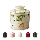 Teapeak porcelain butter keeper with water line keeps butter fresh on the counter for easy spreading.
