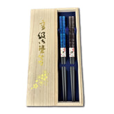 Terra Distribution premium lacquered chopsticks in use, refined finish for elegant dining.
