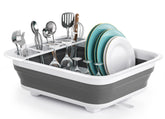 Thanstar collapsible dish drying rack in an RV kitchen, space-saving design.