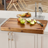 Tidita acacia cutting board with handle showing stable chopping surface