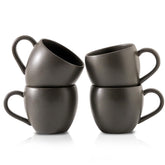 Tikooere coffee mug with black glaze and speckles, ideal for morning coffee rituals.