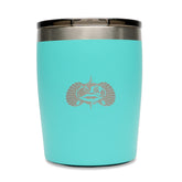 Toadfish Rocks Tumbler Teal on dock keeps drinks cold and spill-free.