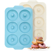 Toeusog donut pan with metal-frame for stable, safe baking.