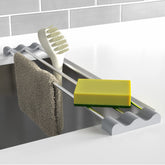Tomorotec over-the-sink rack in extendable setup keeps dishcloths and sponges organized above the sink
