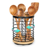 Toosci utensil holder on swivel base offering easy access to spoons and spatulas.