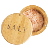 Totally Bamboo salt cellar with magnetic swivel lid on countertop for quick seasoning.