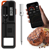 ToyCod Smart Meat Thermometer on dock charger keeps probe ready for grilling.