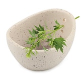 Trasylph Pottery Herb Stripper Bowl exterior view shows hole variety for fast herb prep.