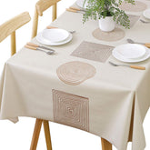 TruDelve heavy-duty vinyl rectangle tablecloth protecting a 54x78 inch table during family meals.