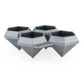 TrueZoo jumbo diamond ice tray with four large diamonds for slow-melting cocktails.