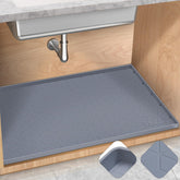 TRZZ under-sink mat 31x22 in a cabinet protects from leaks.