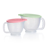 Tupperware Classic Mix-N-Store mint green pitcher front view with ergonomic grip for easy pouring.