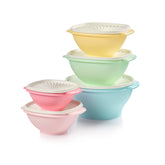 Tupperware Heritage bowls with sunburst lids demonstrate freshness-lock design
