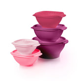 Tupperware Heritage Collection vintage pink bowls with nesting design for compact storage.