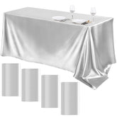 TURSTIN silver satin tablecloth 4-pack on a table adds elegant, event-ready shine for weddings.