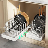 Two-pack pull-out pots and pans organizer rack in white for cabinet visibility and easy access.