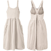 Uaussi cross-back apron on a model shows comfortable fit for long tasks.