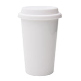 UDMG travel coffee cup with lid and sleeve in white ceramic for spill-free on-the-go sipping.