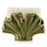 Uiddo ceramic sponge holder on kitchen sink keeps sponges dry and ready.