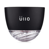 Üllo wine purifier on glass shows easy purification for cleaner tasting wine