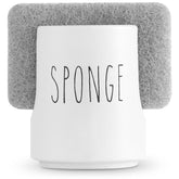 Ultimate Hostess ceramic sponge holder on a white sink keeps the counter tidy.