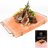 UMAID Himalayan salt block on a stovetop grill for enhanced flavor.