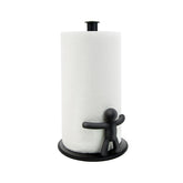Umbra Buddy black countertop paper towel holder on a kitchen counter for one-handed tearing