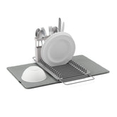 Umbra UDry over-the-sink dish rack with 16-plate capacity for organized drying.
