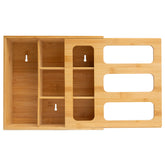 Umiboo bamboo bag storage organizer in a drawer keeps bags neatly separated for quick access.