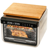 Umilife cutting board on a convection oven providing secure fit and counter protection.