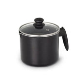 Universal 51 oz non-stick milk pitcher with glass lid for precise heating.