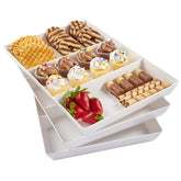 US Acrylic Avant White 15x10 divided trays on table, ideal for classy appetizers.