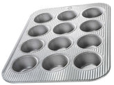 USA Pan muffin pan top view highlights even heat for uniform muffins