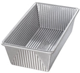 USA Pan loaf pan front view highlighting its 1.5 lb capacity for large loaves.