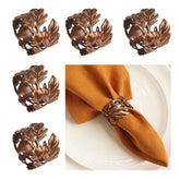 Utalek leaf shape napkin ring in bronze finish elevates table decor for formal dinners.
