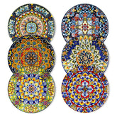 Vancasso Simi plates on table showcase vibrant Boho patterns for colorful dining.