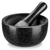 Velaze granite mortar and pestle with 580ml capacity for efficient herb grinding.