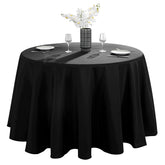 VidaFete 90-inch round black tablecloth on an elegant dining table for easy cleanup.