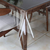 Walrus clear vinyl tablecloth protector on a dining table showing waterproof surface protection