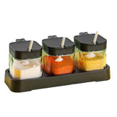 WANYISHUN condiment jars set on tray for organized countertops.