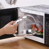 WENWELL microwave splatter cover with a sturdy handle for safe lifting