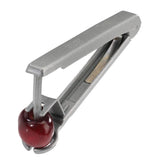 Westmark Kernex cherry pitter with ergonomic handle for easy pit removal.