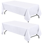 White Classic WEALUXE 8ft rectangle tablecloth flatlay enhances event aesthetics.