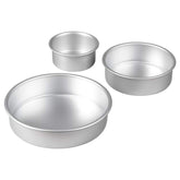 Wilton aluminum round cake pan 4-inch for even layers and reliable bake results.